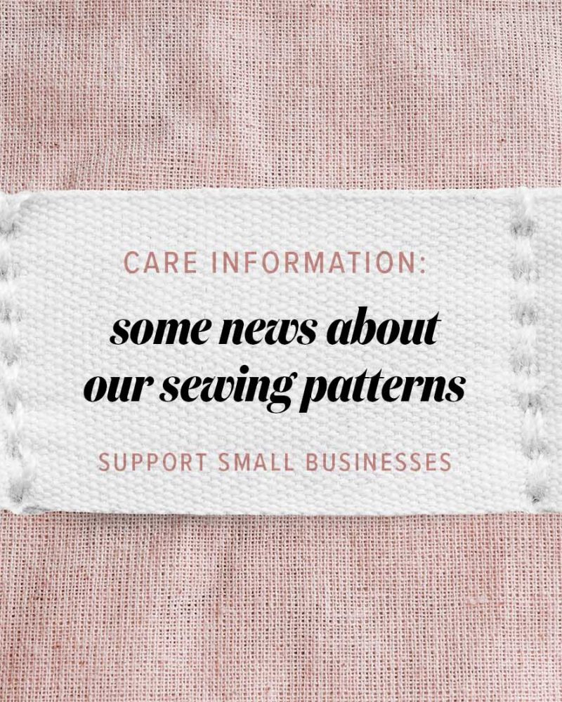 Clothing label says handmade on beige linen background